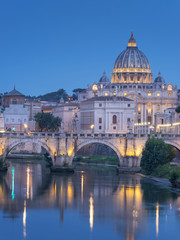 view to St Peter Cathedral and part of bridge in twilight in Rome in Italy