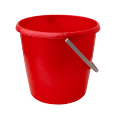 New, classic, plastic bucket. Red bucket isolated on a white background.