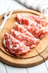 Sliced salami. Sausage meat.