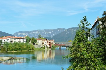 Fototapeta na wymiar Italian town with mountains