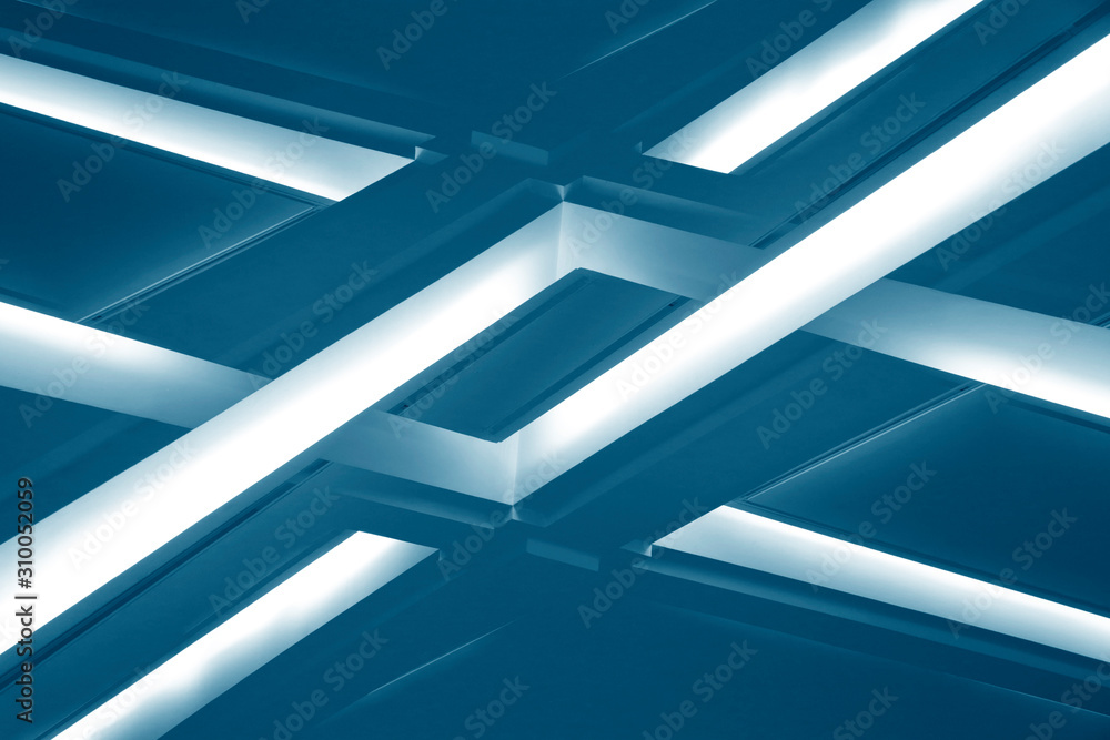 Poster lamps on dropped ceilings. abstract modern architecture of an office building interior resembling gl