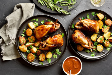 Roasted quails carcasses with potatoes