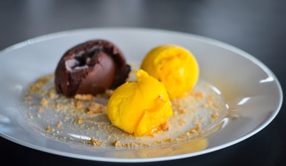 tasty home made mango & chocolate ice cream with biscuits