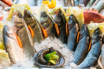 Fresh sea fish in ice at the market. healthy seafood