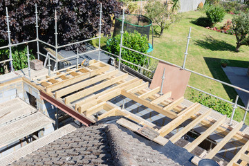 Residential renovation project. Unfinished structure of the roof 