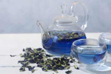 Organic blue tea Anchan, Clitoria, Butterfly Pea in glass teapot