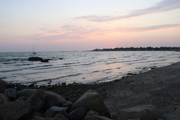 Beautiful New England coastal beach summer sunset