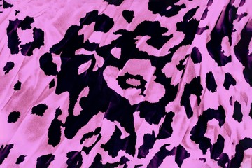 Fototapeta na wymiar Black and pink background with leopard print, trendy leopard pattern