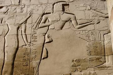 Egyptian ancient pictures on the stone wall