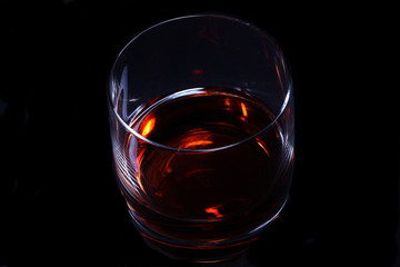 whiskey or cognac on a black background. Luxury alcohol concept