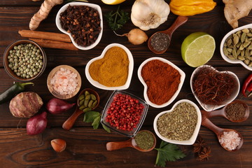 Spices and herbs on table. Food and cuisine ingredients and lemon