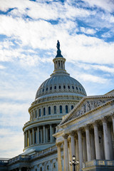 Obraz premium East side of the US Capital dome with blue sky background