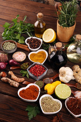 Spices and herbs on table. Food and cuisine ingredients with oil and vinegar
