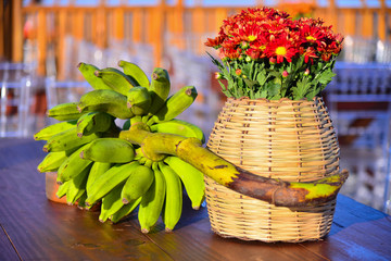 red flowers in a basket, natural flower