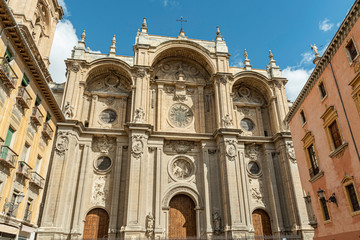Fototapeta na wymiar Facade of the historic Cathedral of Granada in Spain. South West front of Santa Maria de la Encarnacion Cathedral