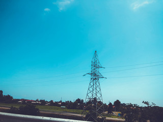 Cloudless sky, horizon, view from the car on the road. Road trip