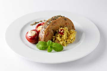 Vegan roast with quinoa salad and stuffed red pepper