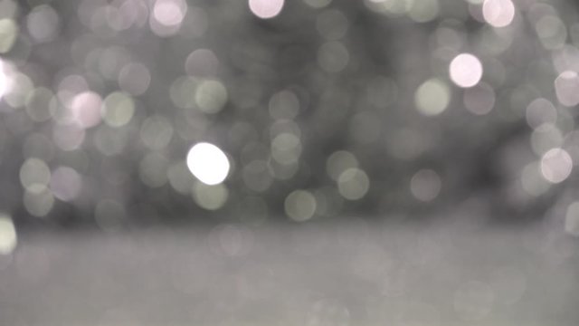 Christmas background with silver bokeh lights