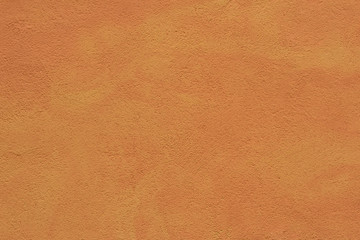 Old wall texture. Orange background. Frame for the inscription.
