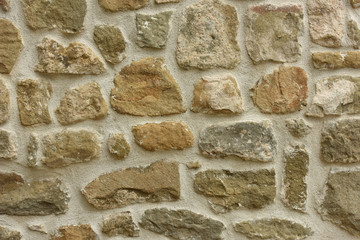 Old stone wall. Brick background. Work at the construction site.
