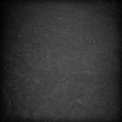 Dark grey black slate background or texture. © peekeedee