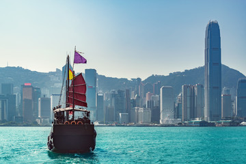 Naklejka premium Retro small ship in Hong Kong harbour.