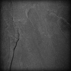 Dark grey black slate background or texture.