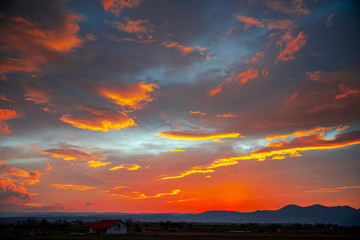 Fototapeta na wymiar Fantastic clouds at the sunset