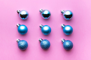 Christmas background. Xmas balls isolated on pink. Bubble pattern decoration. Flat lay. Winter concept