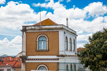 Traditional architecture of the facades covered with ceramic tiles called azulejos in the city of Lisbon in Portugal