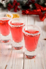 Christmas drink red in glass glasses.