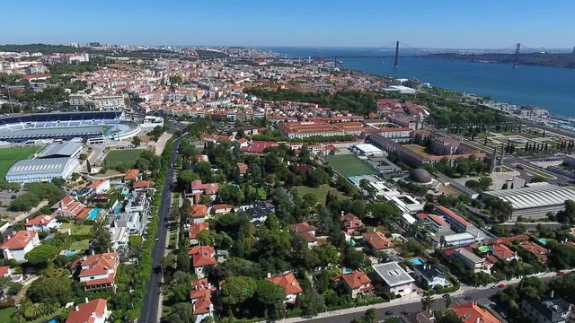 Lisbon cityscape river tagus belem Portugal aerial shot 4k