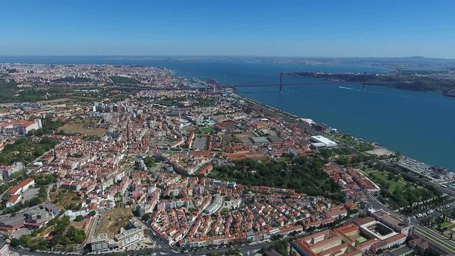 Lisbon cityscape river tagus belem Portugal aerial shot 4k