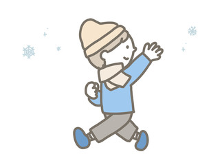 Boy running on a snowy day