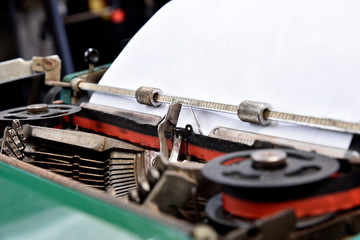 antique green typewriter, analogical typing