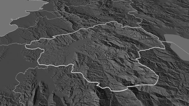 Elbasan, county with its capital, zoomed and extruded on the bilevel map of Albania in the conformal Stereographic projection. Animation 3D