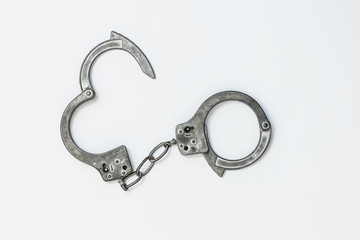 Handcuffs on white background isolate