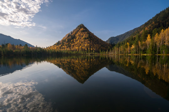 View of Mount Monomakh Hat. Warm lakes on the Snezhnaya river, near Baikal