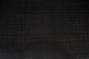 Texture of diagonal and rectangular metal lattice fine weave lattice on black background