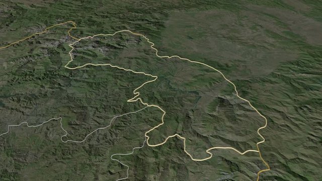 Kuk&euml;s, county with its capital, zoomed and extruded on the satellite map of Albania in the conformal Stereographic projection. Animation 3D