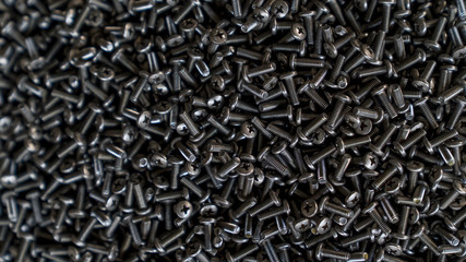 Metal Bolts top view close-up. background texture