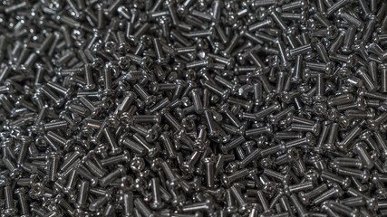 Metal Bolts top view close-up. background texture