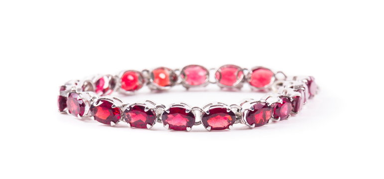 Bracelet with the ruby stones on the white