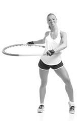 young sporty woman with hula hoop
