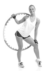 young sporty woman with hula hoop