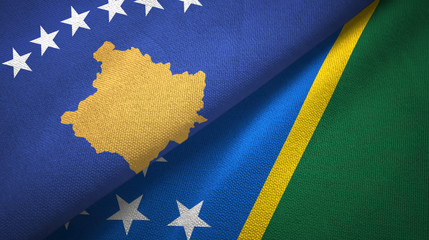 Kosovo and Solomon Islands two flags textile cloth, fabric texture