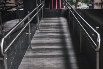 Fototapeta na wymiar dark gray ramp with metal handles