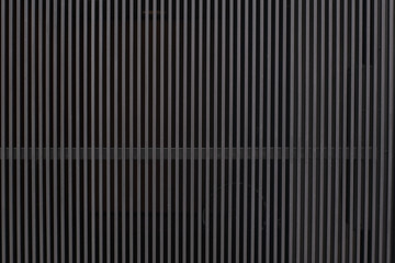 metal wall with vertical gray bars