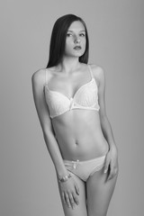Fototapeta premium Sexy woman in white lingerie gorgeous figure.