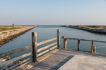 Wooden terrace with lantern over sea background, Cha-am, Thailand